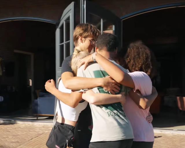 Between teenagers series with young people hug each other